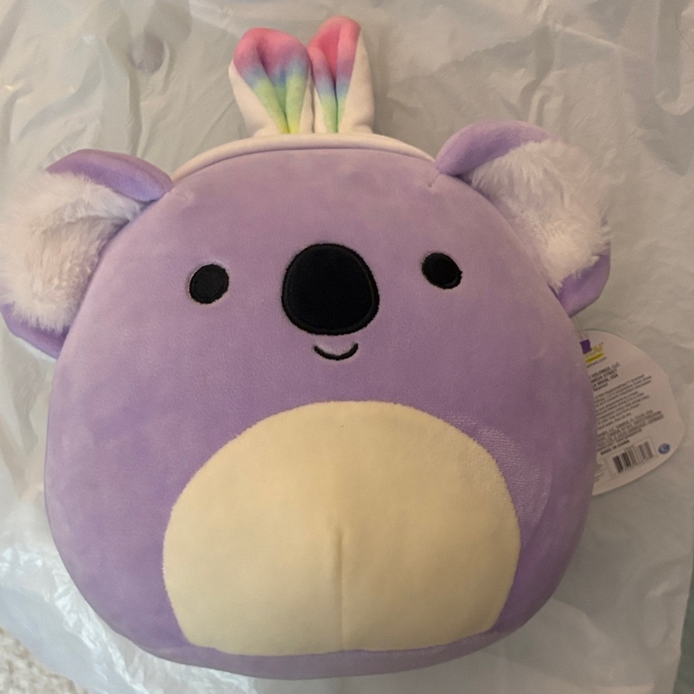 Squishmallows Lavender plush koala with colorful ears. Her name is Kayla.